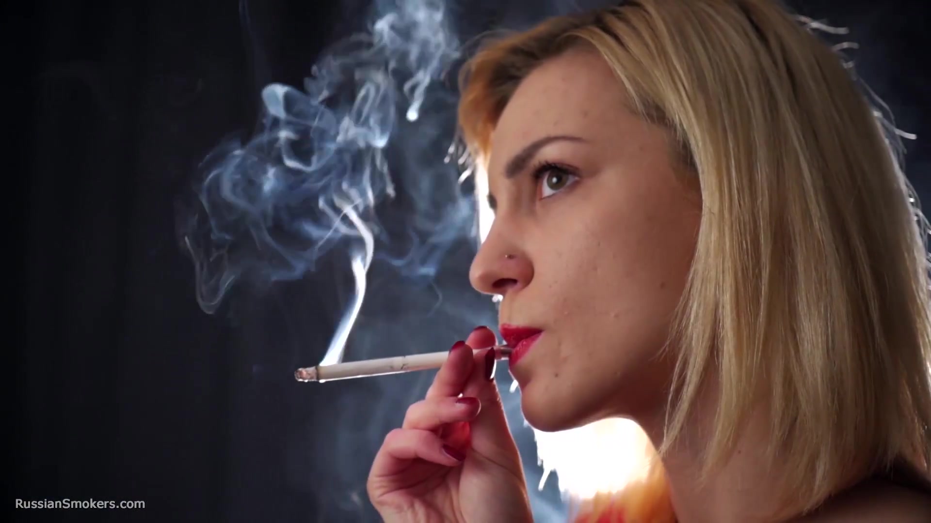 Many Many Nose Exhales With Cork Cigarette