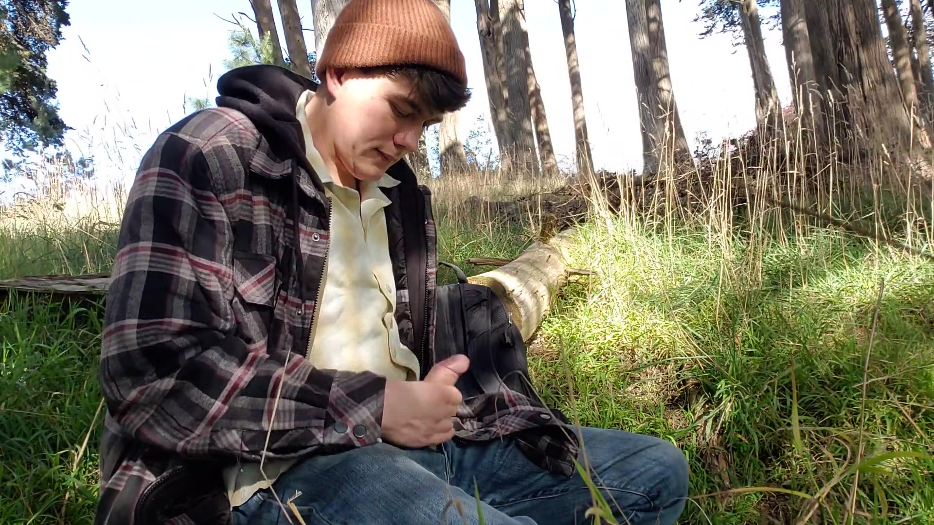 Boy stops jacking off to piss in the woods