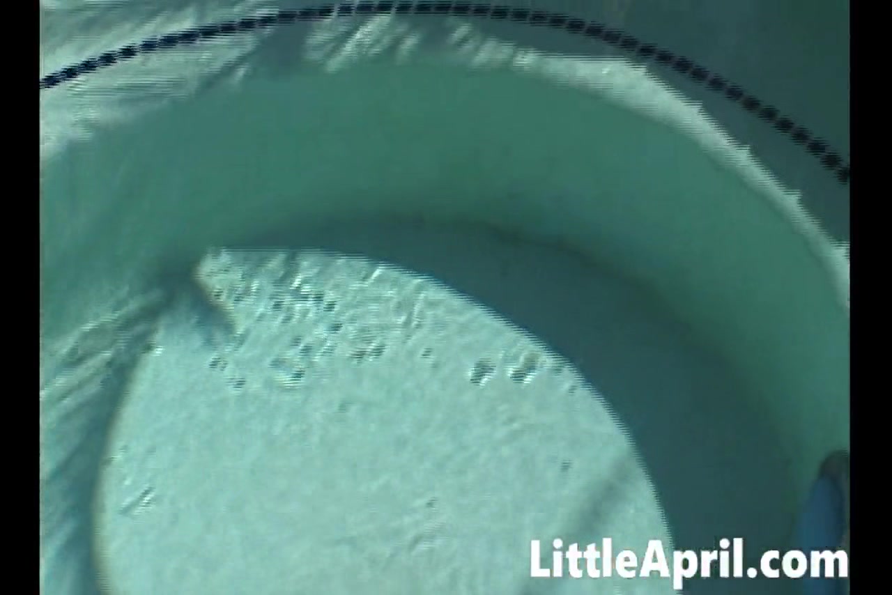 Little April fingers herself in the pool in a POV solo