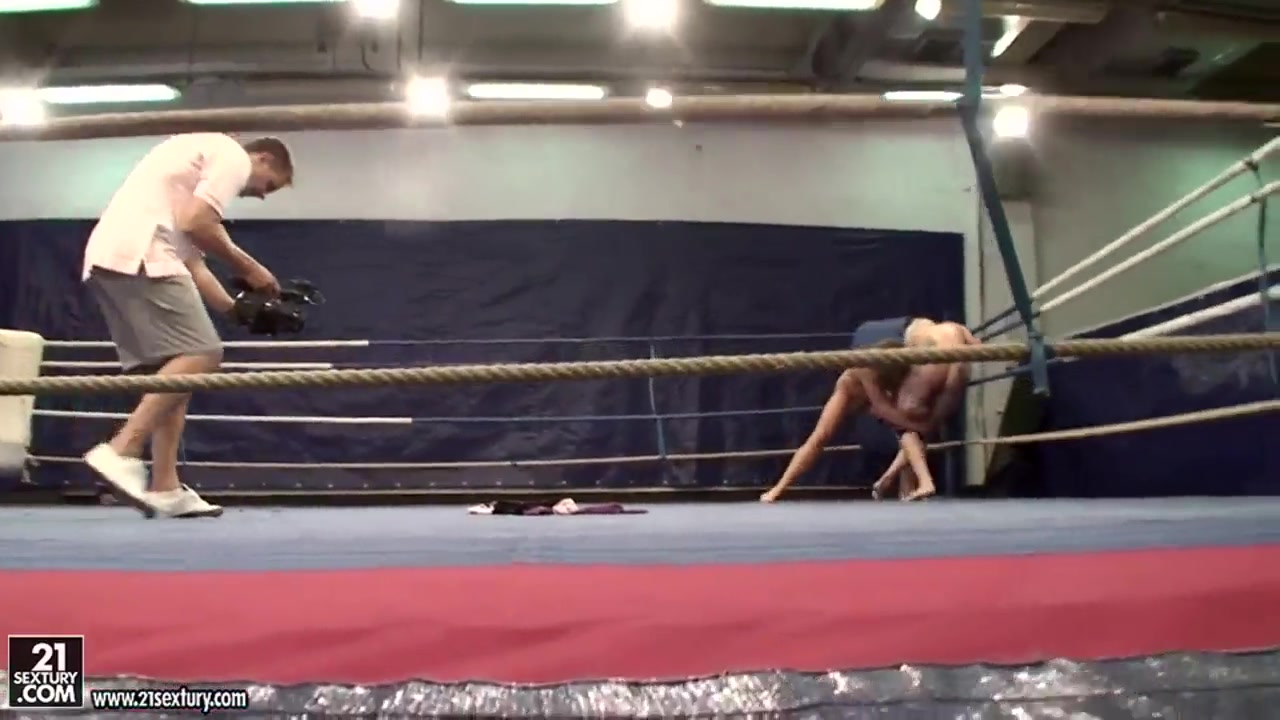 Angel Long and Cathy Heaven are having fun fucking each other on a boxing ring