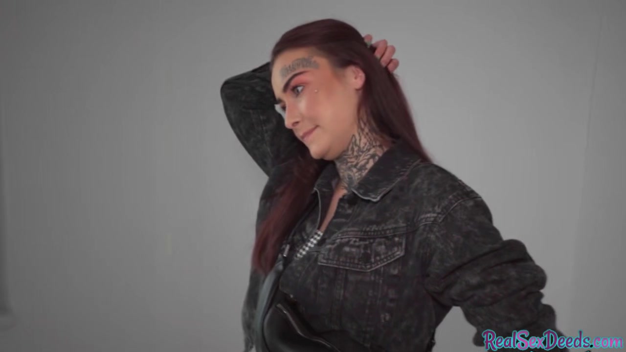 Redhead with tattoos and piercings receives doggystyle fuck