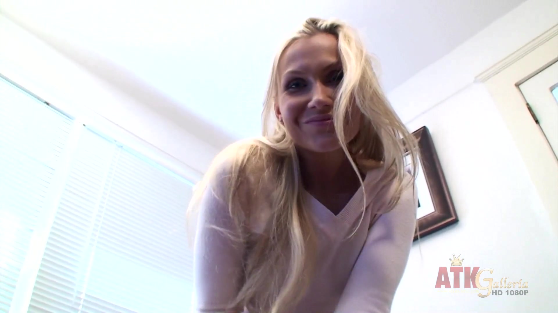 Michaela masturbates on wooden desk