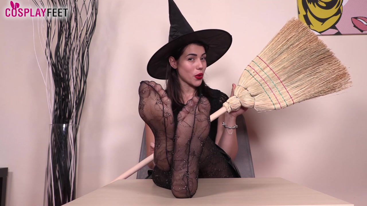 Irresistible Petra in a sexy witch Halloween costume