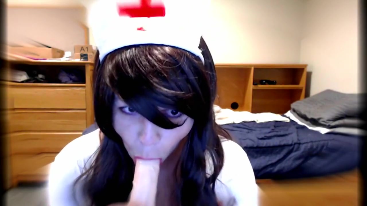Cute Crossdresser Nurse Blows Dildo