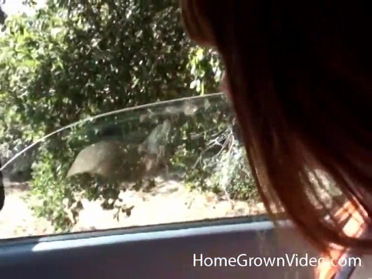 Thick redhead sucking cock outdoors