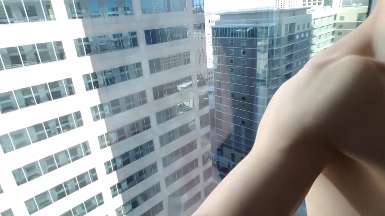 Exhibitionist Twink Fucks his Hole on High Rise Hotel Window ( 1)