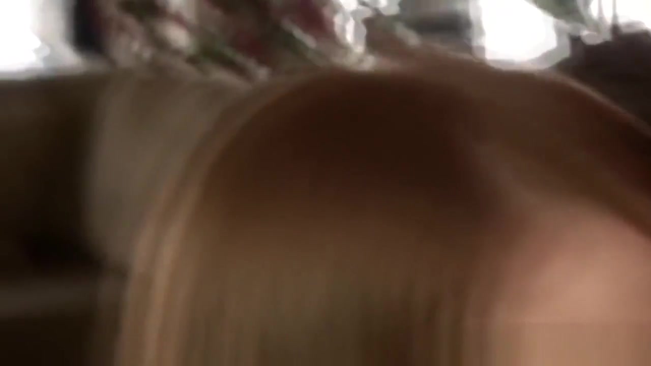 Busty Red Haired Vixen Tugging a Long Cock