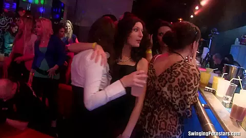 Sexy lesbians dancing in club