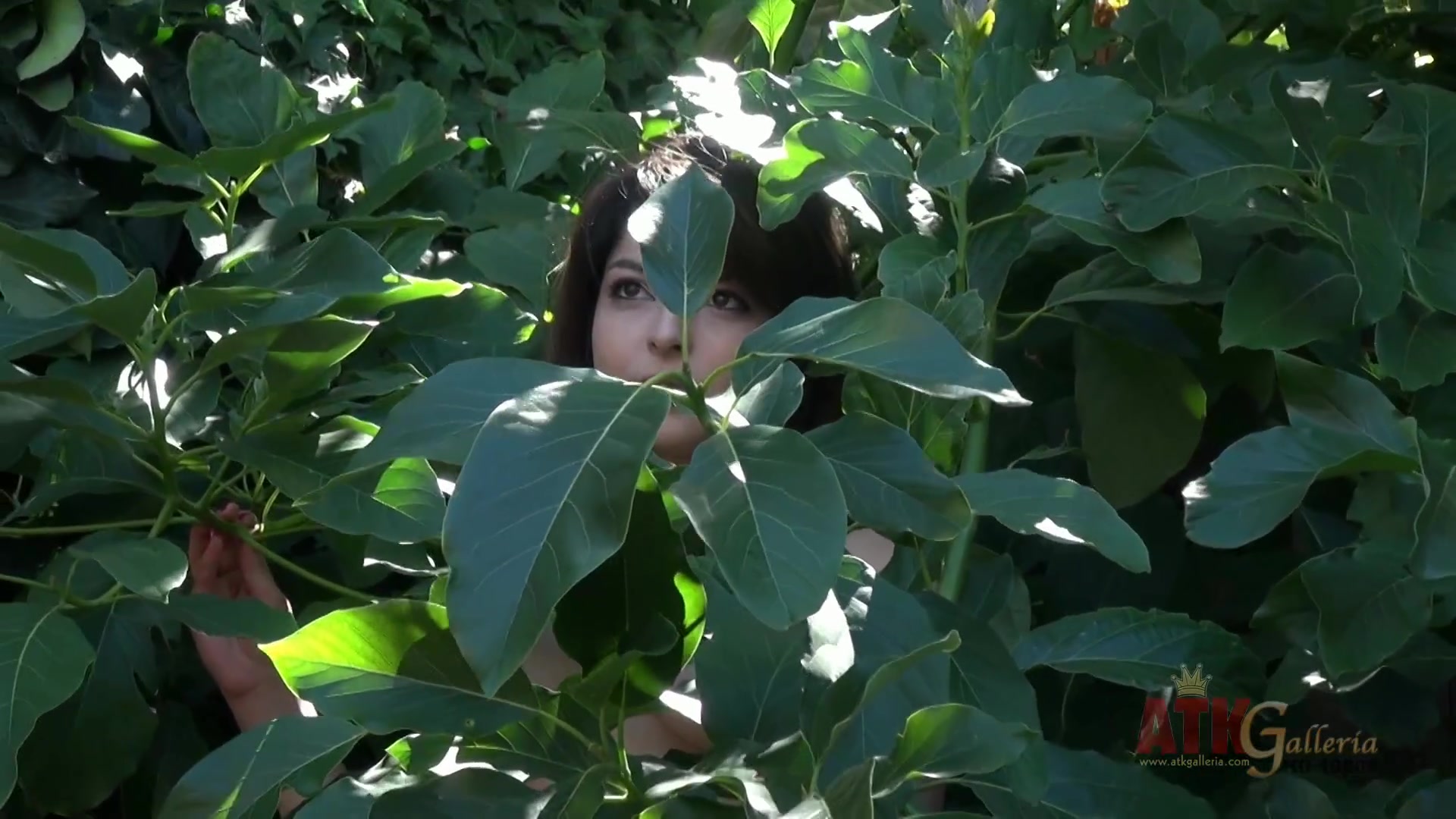 Phoebe is outside getting naked for a photo shoot