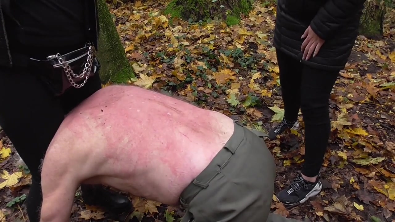 Spank session in the forest, male slave by Femdom Austria