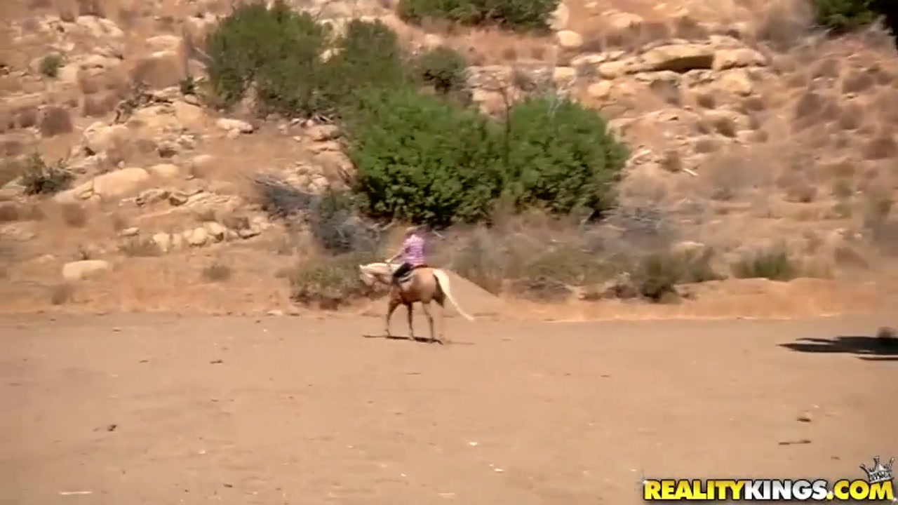 Ridiculously busty Sierra Skye rides the horse
