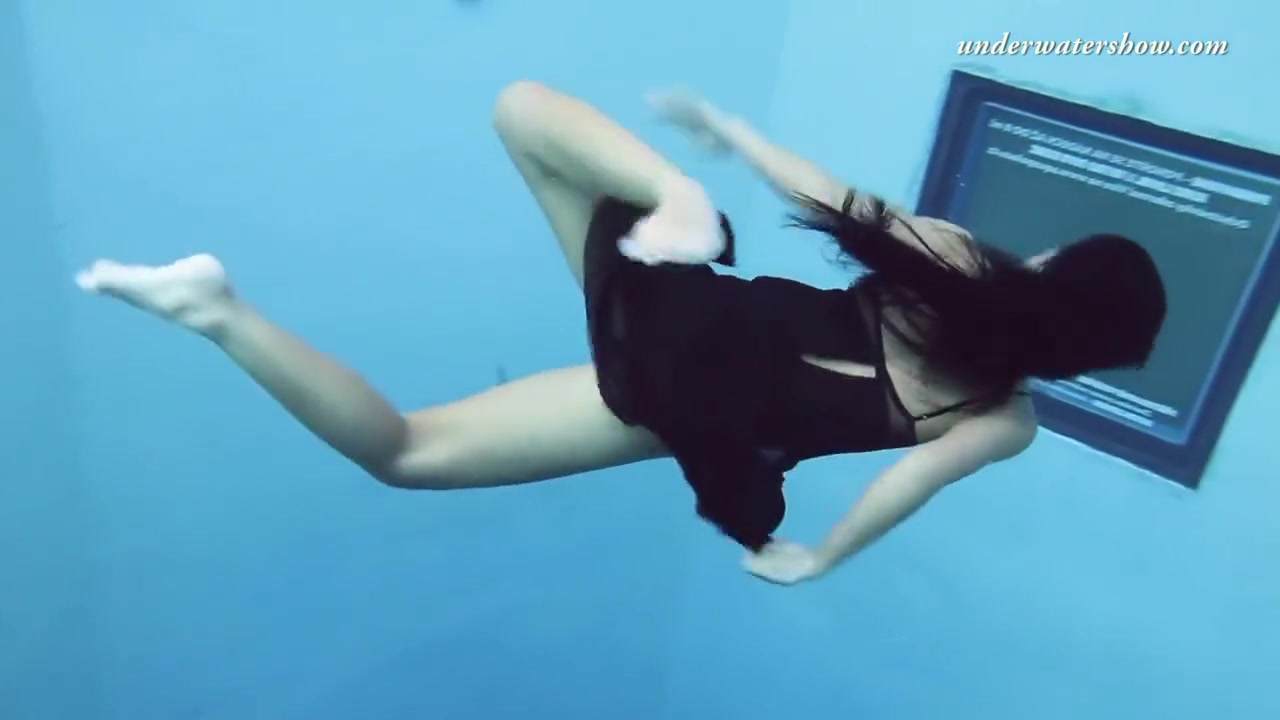 Gypsy Black Haired Babe Swimming Underwater