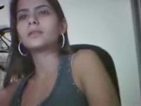 She is fully naked and playing with her pussy
