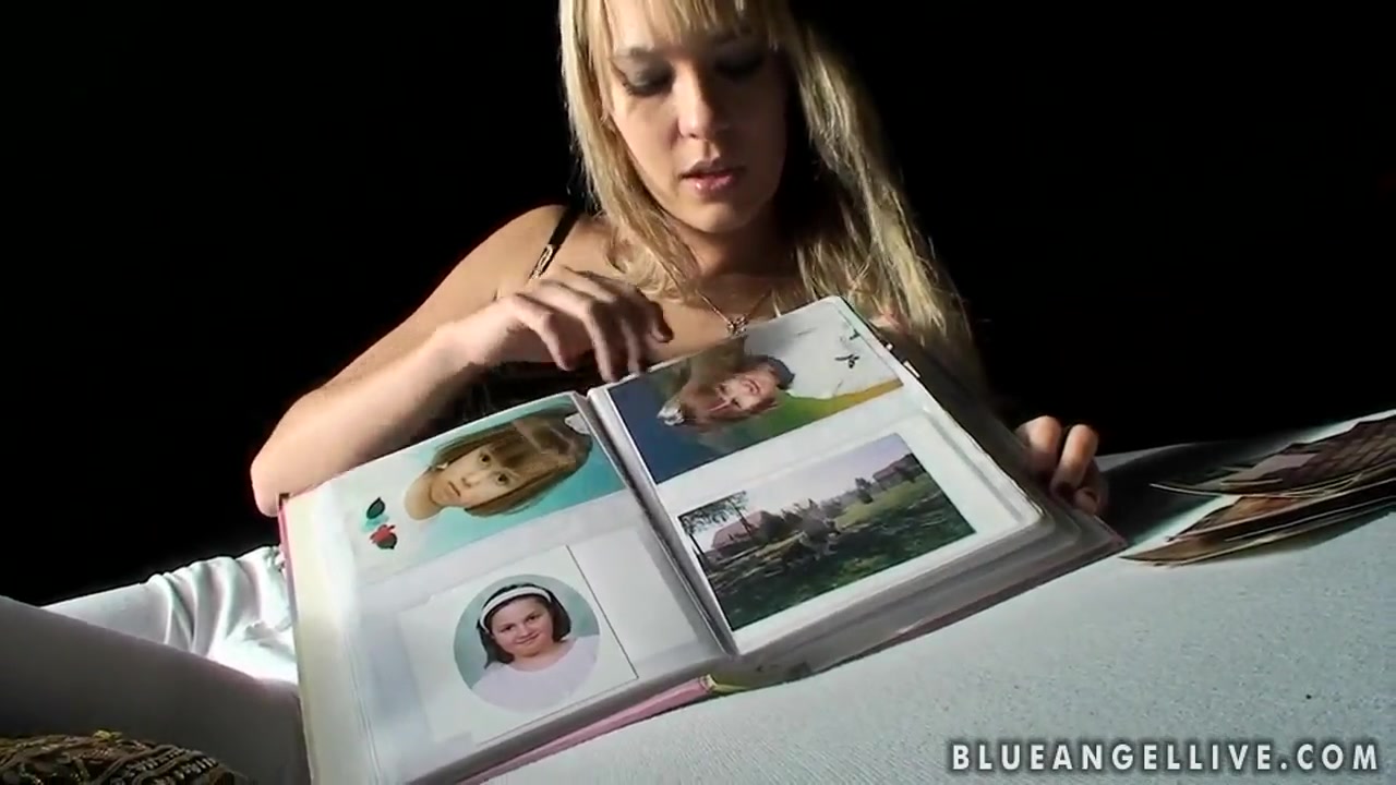 Blue Angel shows photo album in sexy outfit