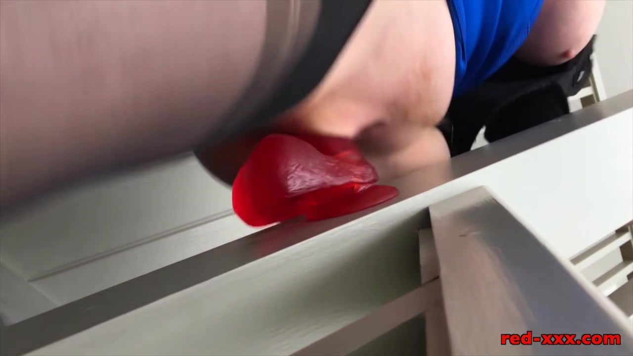 Busty mature Red XXX fucks her dildo on the stairs