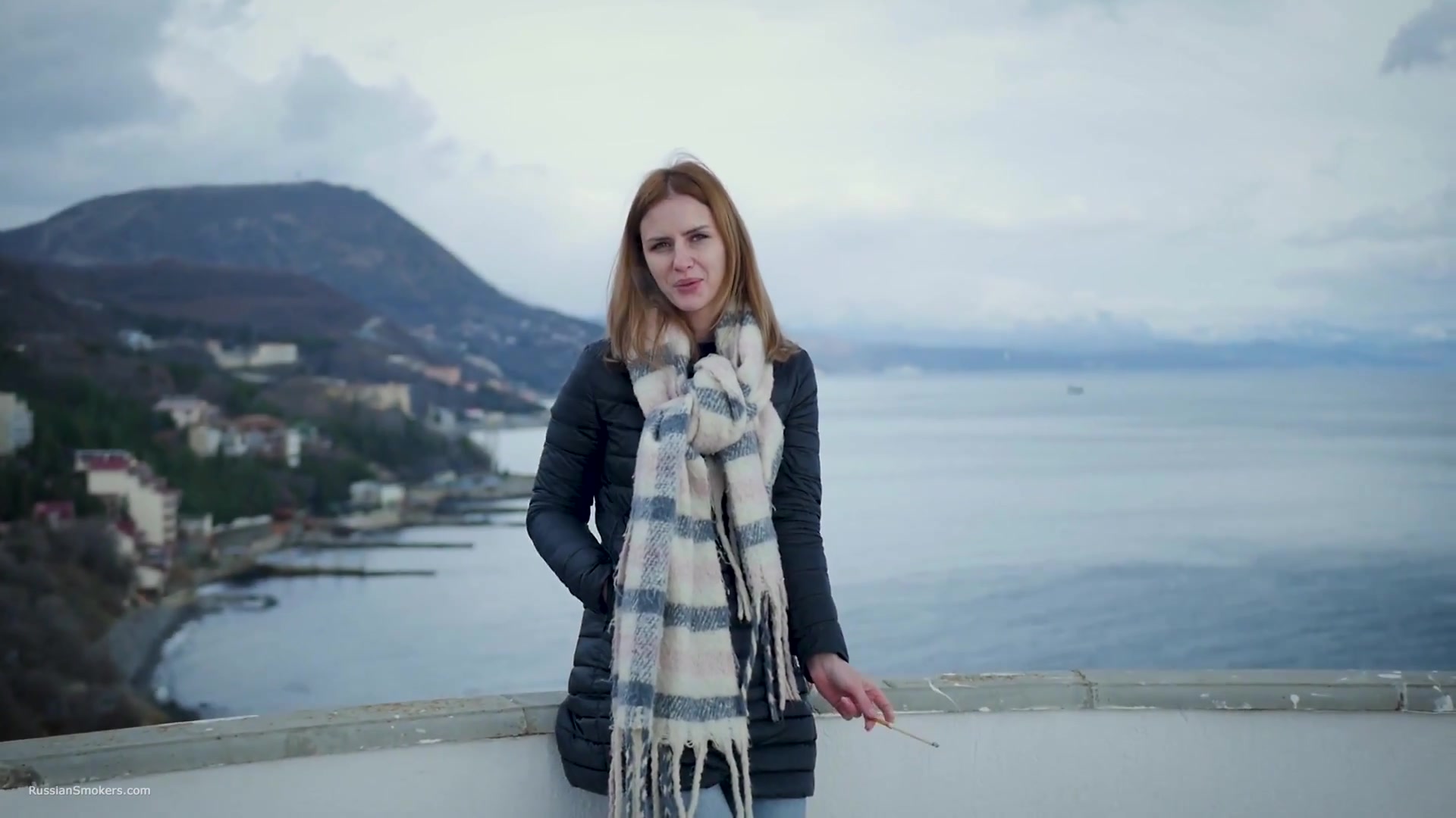 Beautiful Lady Is Smoking Two Saratoga Cigarettes In A Row On A Beautiful View