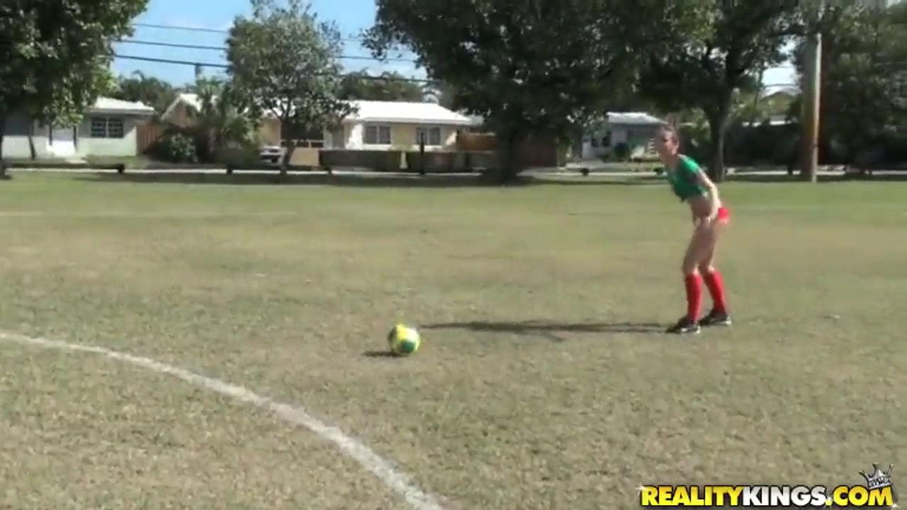 Molly Cavalli and Tiffany Tyler play football