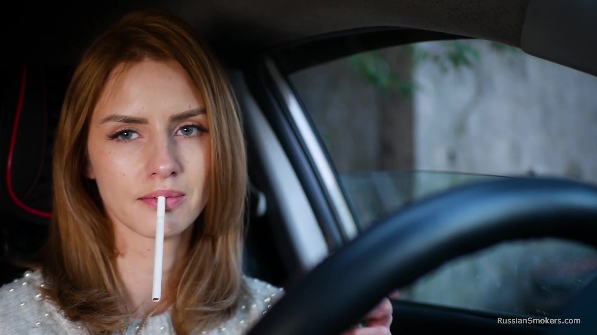 Meet Anastasia In Her Car While She Is Smoking Two 120mm All White Cigarettes