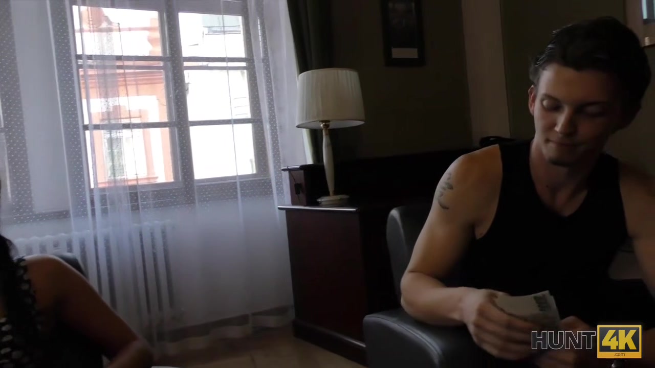 HUNT4K. Guy stretches young chick on sofa while cuckold films this