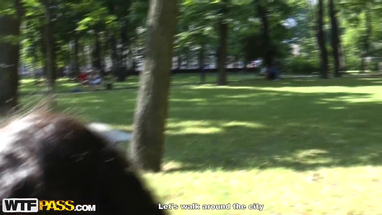 Cute curly brunette Leonora shows her boobs in park