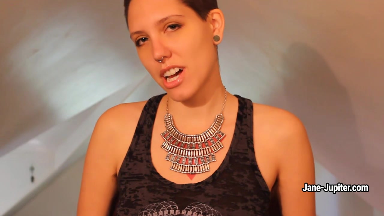Jane Jupiter shows her pierced tits and hairy arm-pits