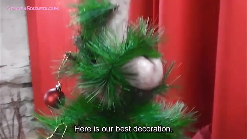 Whores decorating Christmas tree