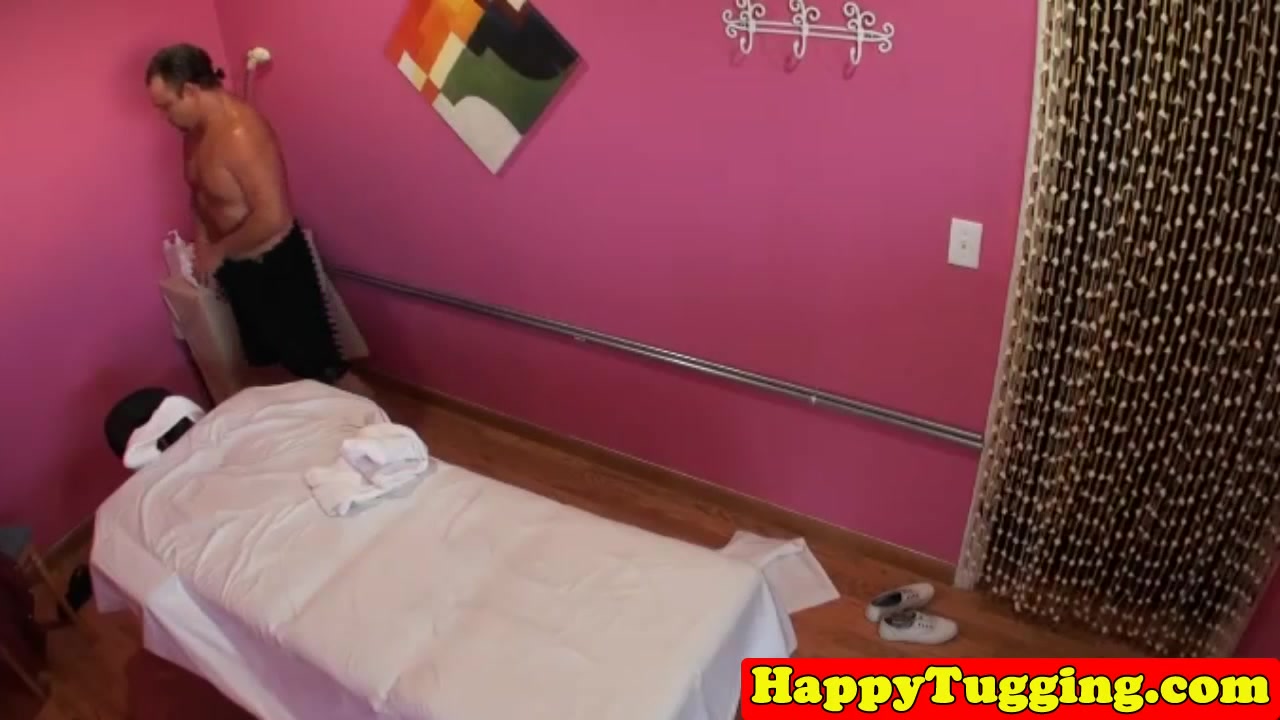 Bigtitted asian masseuse tugging client cock