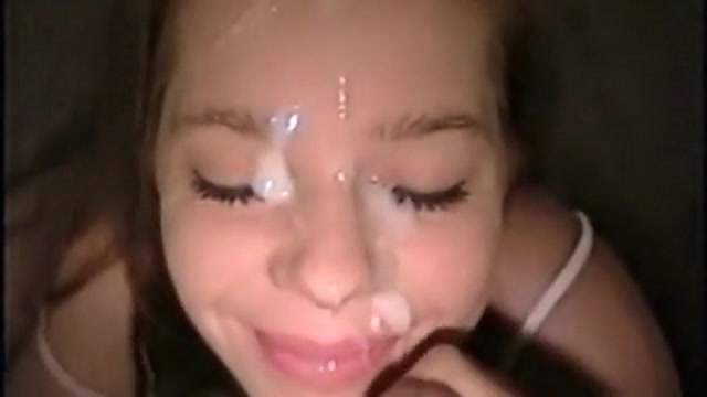 Amazing redhead receives a load of cum on her face