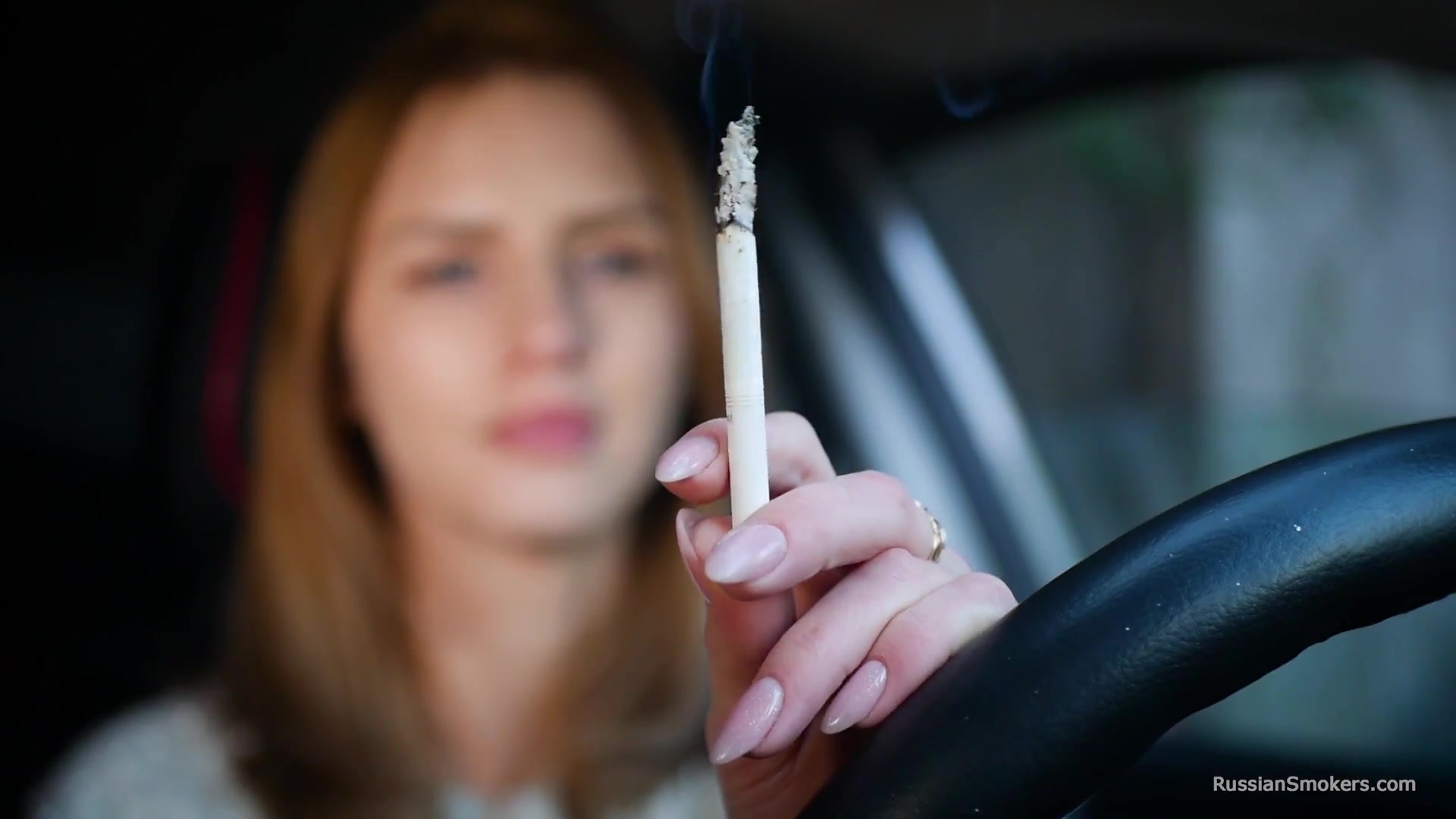 Meet Anastasia In Her Car While She Is Smoking Two 120mm All White Cigarettes