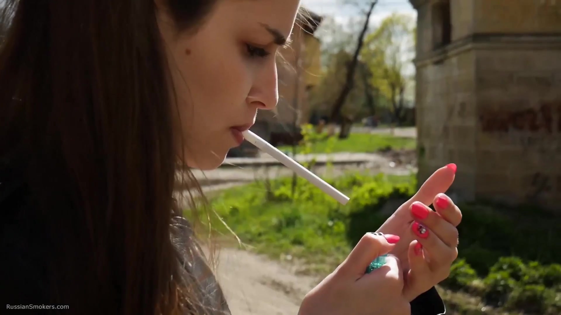 Non Smoker Masha Is Smoking Two All White 120mm Cigarettes Outside