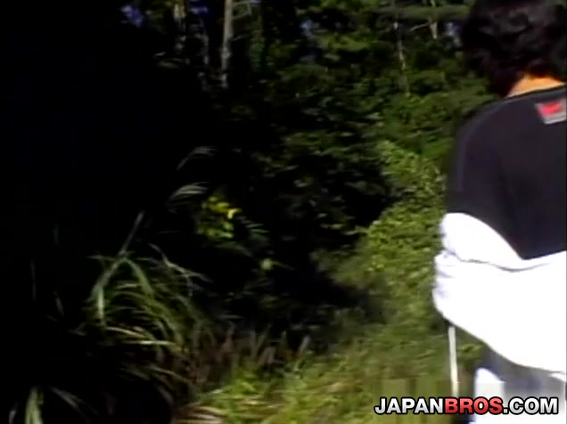 Nice Japanese nymphet has hands tied outdoor