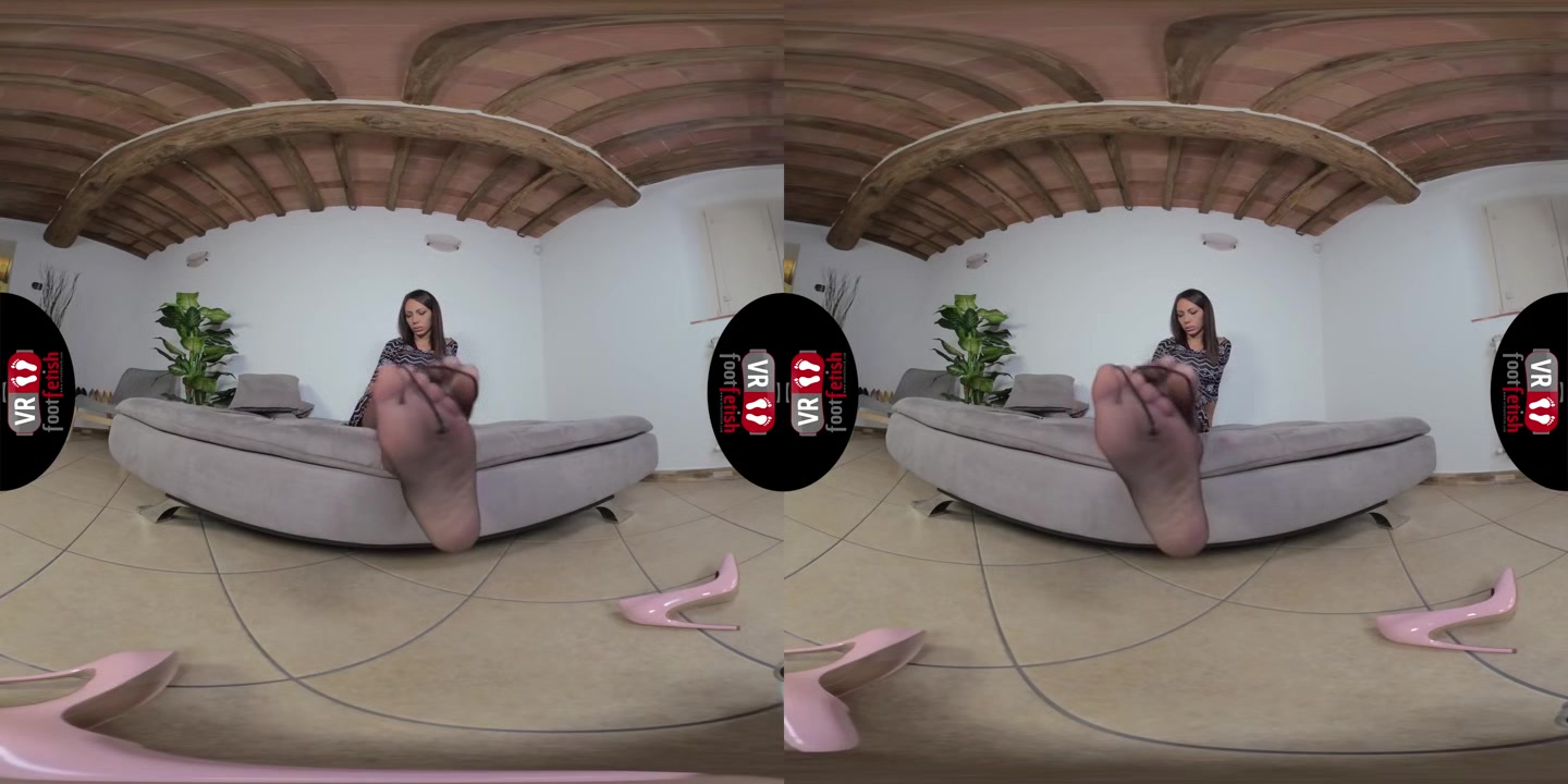 Stunningly Beautiful Daniela Lets Her Pink Stilettos Dangle Off Her Feet - VRFootFetish