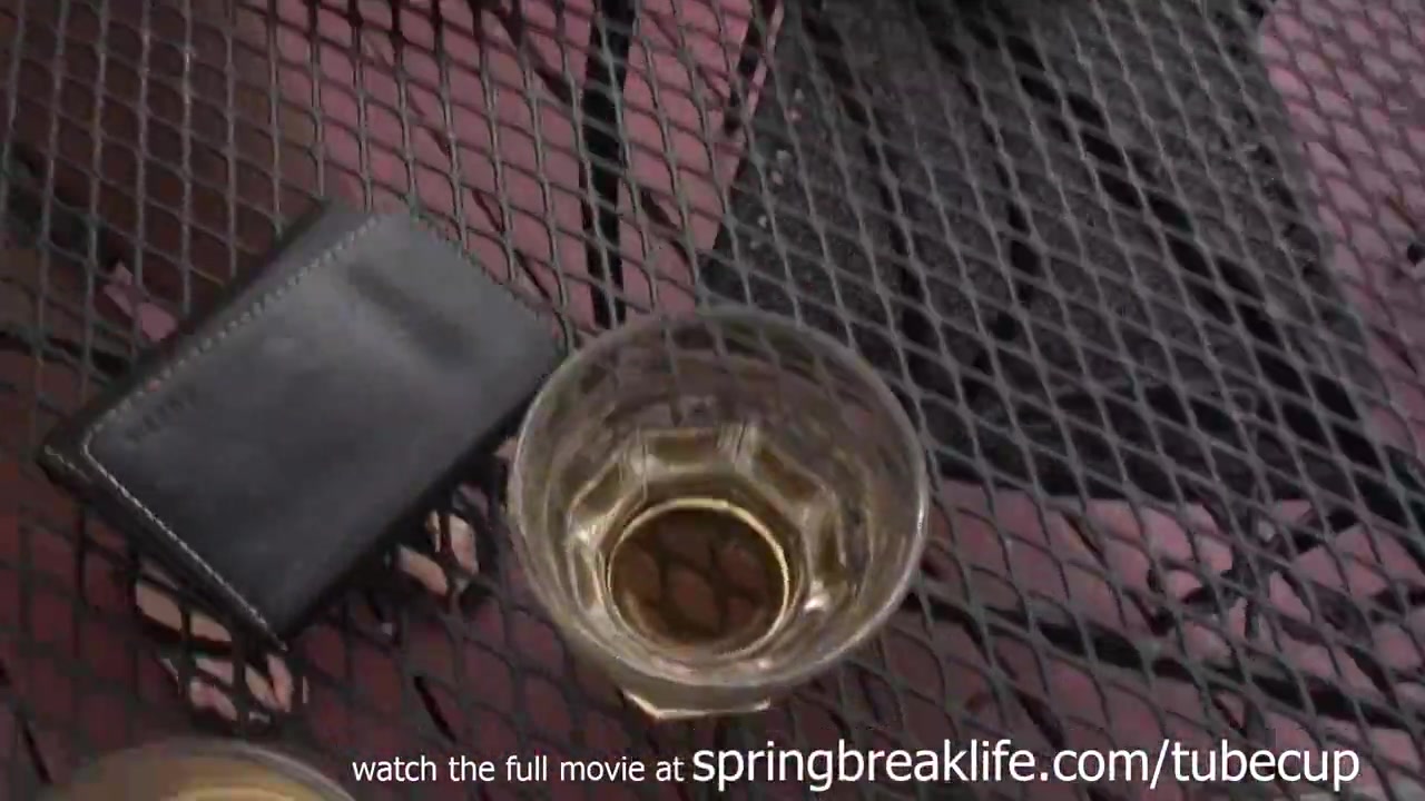 SpringBreakLife Video: Brunette Flashes In Bar Then Pees