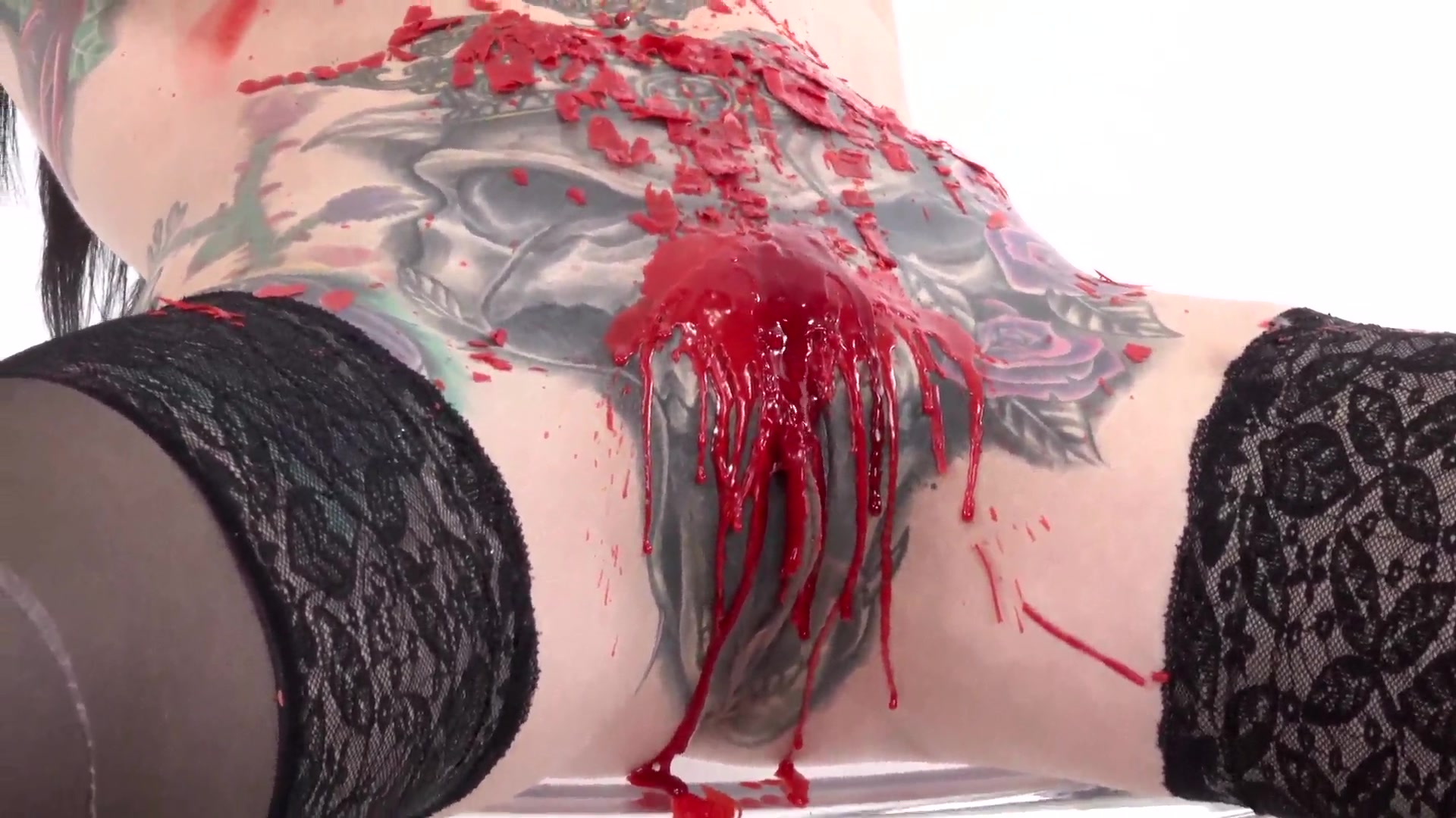 Tattooed Fetish Model Marie Bossette Playing With Candle Wax