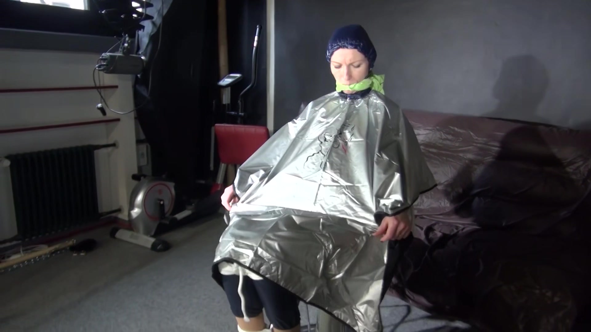 Sexy Ronja Being Tied, Gagged And Hooded On A Chair With A Clothgag Wearing Sexy Blue Shiny Nylon Rainwear (Video)