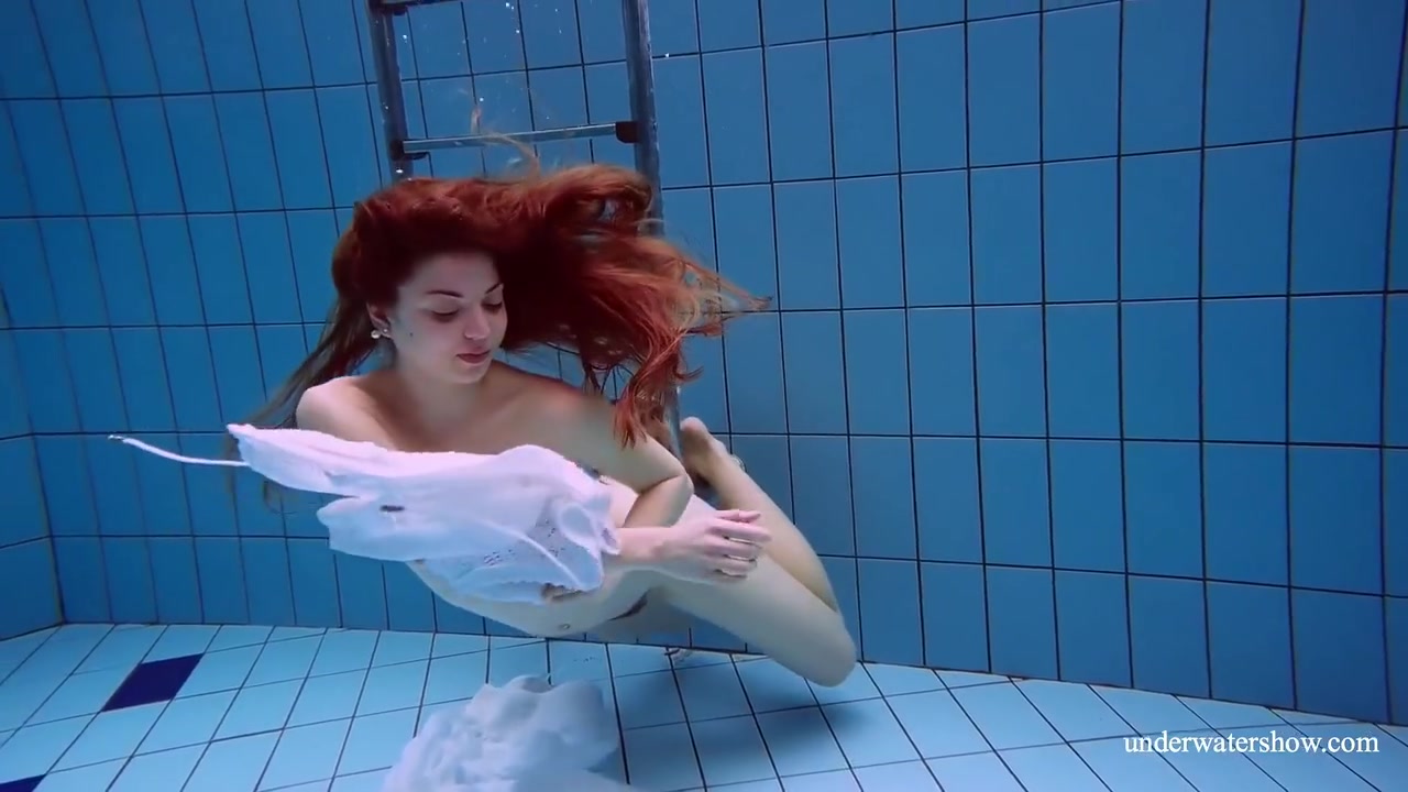 Redhead Marketa In A White Dress In The Pool