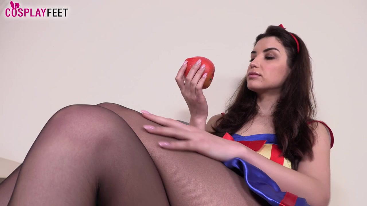 Stunning Layla in a sexy Snow White costume teases you with her nyloned feet
