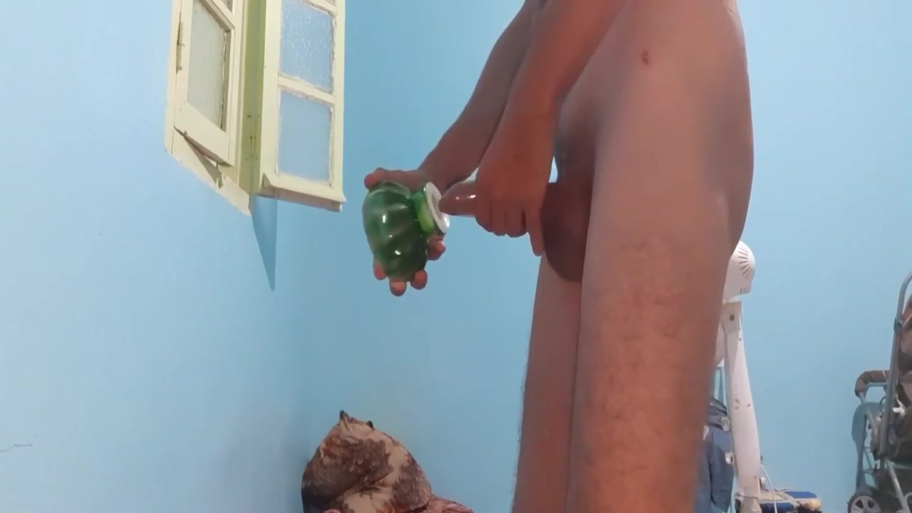 Masturbating With A Condom Using A Big Raging Cock