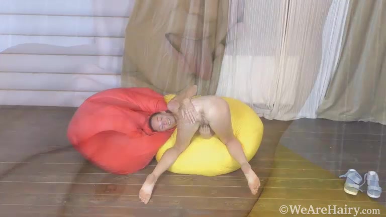 Nata masturbates on her colorful bean bags