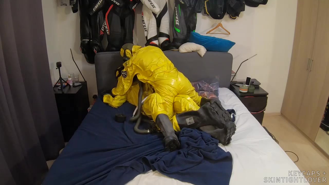 Vacuuming in tellchen hazmat suits