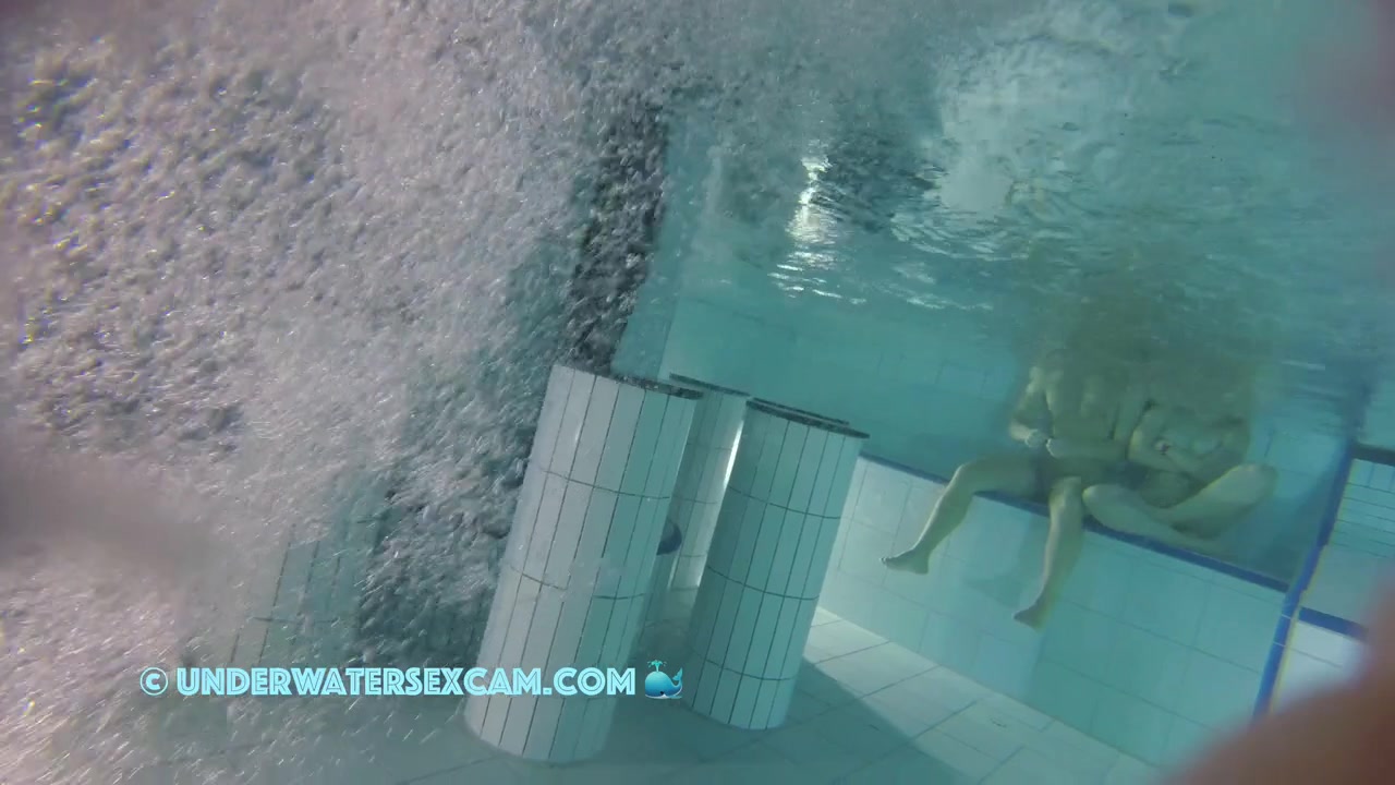 Sporty Couple Regenerating On An Underwater Bench