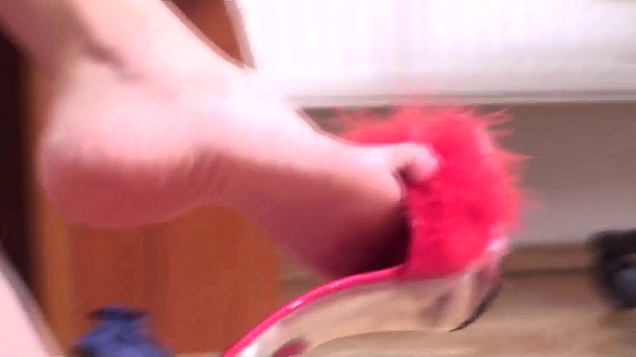 Dangling red feather heels by Foot Girls