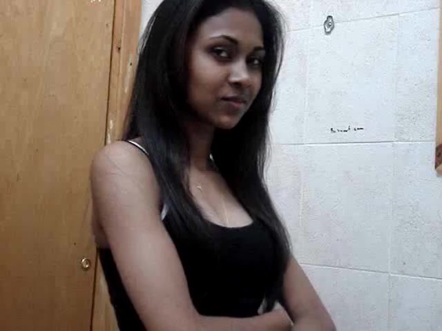 Adorable Oriental lady undresses very slow to let to fantasize