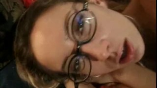 Tracey Williams gets anal action and takes a hot load all over her glasses!
