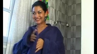 Beautiful girl soaps up in the shower