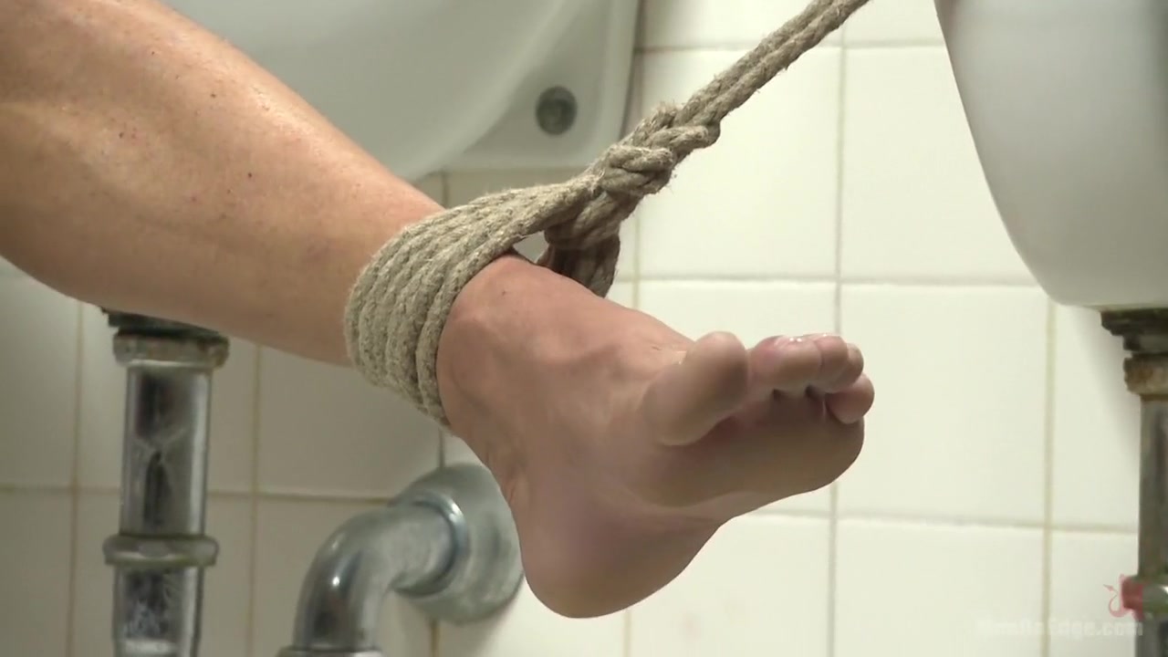 College jock gets a crash course in edging while bound to the urinals