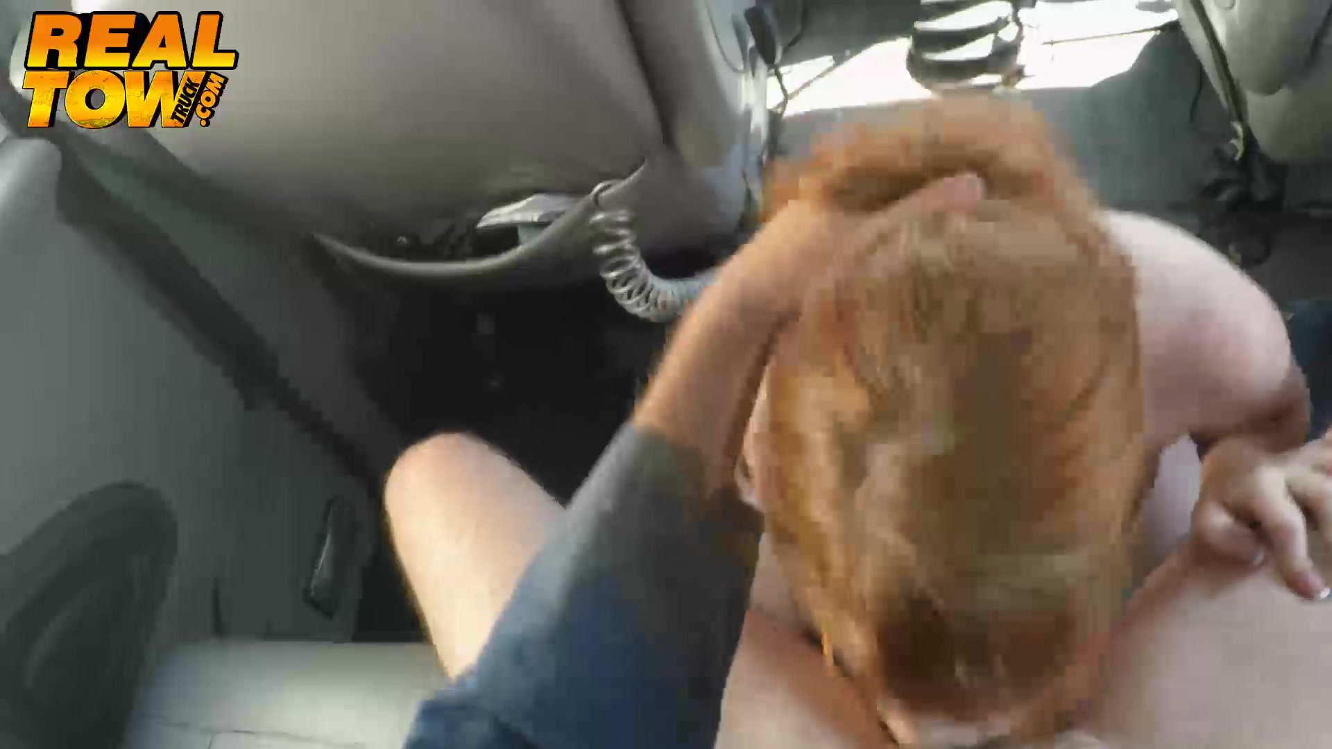 Redhead babe giving a great blowjob so she doesnt get towed