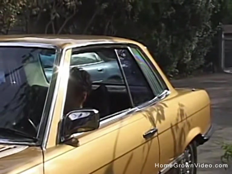 Cute blonde amateur giving a handjob in a car