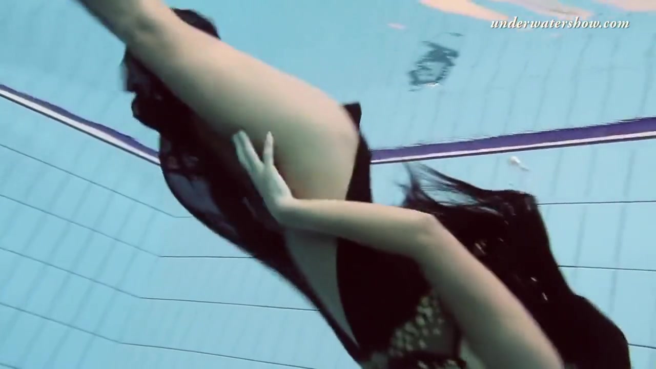 Gypsy Black Haired Babe Swimming Underwater