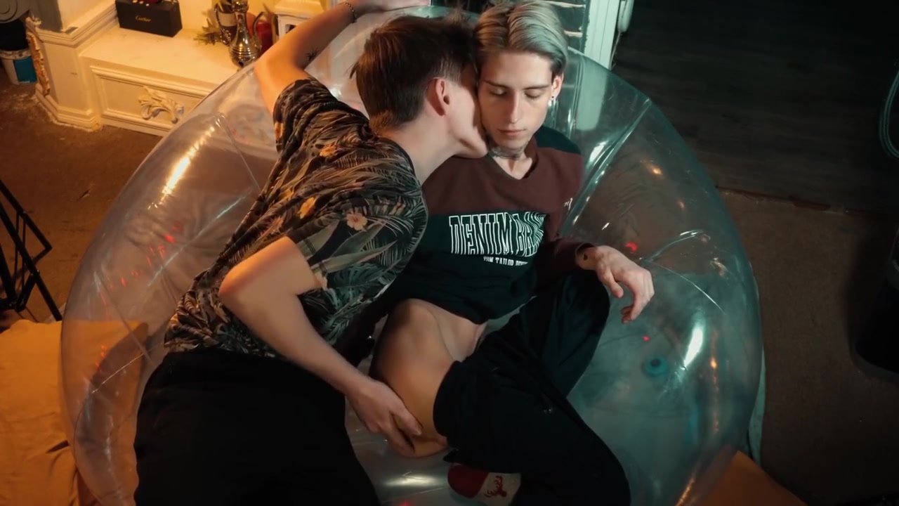 Two Sweet Guys Share An Inflatable Chair